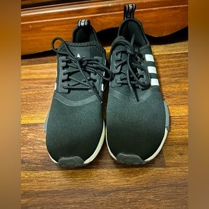 Adidas NMD_R1 black and white athletic shoes